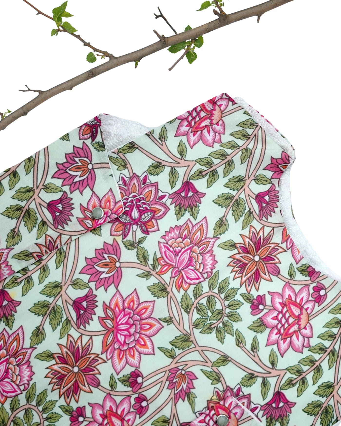 Close detail of the lotus vine print and its side placket